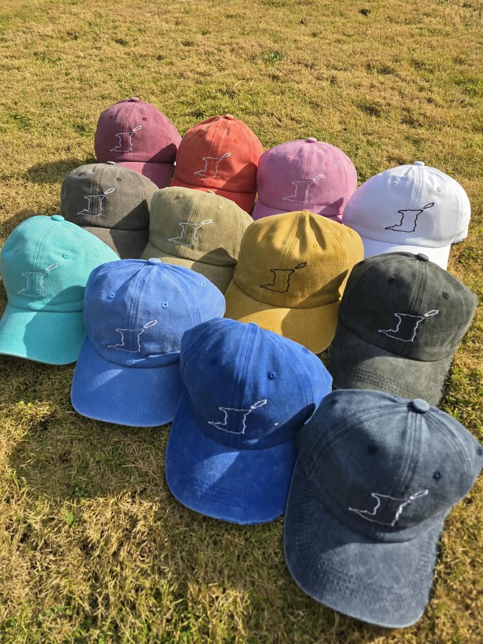 DNM caps in assorted colours by Trini Trunks